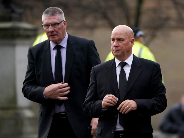 Former Rangers goalkeeping coach Jim Stewart (left) and former Rangers coach Kenny McDowall attend the memorial service.