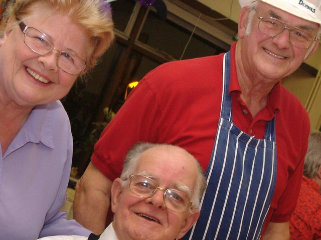 Marina and Dennis Townsend serve up Halloween dinner to Tony Biddy at the Cyril Stone Centre in Mansfield, 2009.