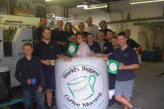 Staff at the Sheffield-based print group, The Production Company, got ready to raise money for Macmillan Nurses by taking part in the Worlds Biggest Coffee Morning Day in 2003