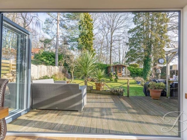 On a sunny summer's day, this is the view of the back garden you can expect from the bi-folding doors of the kitchen.