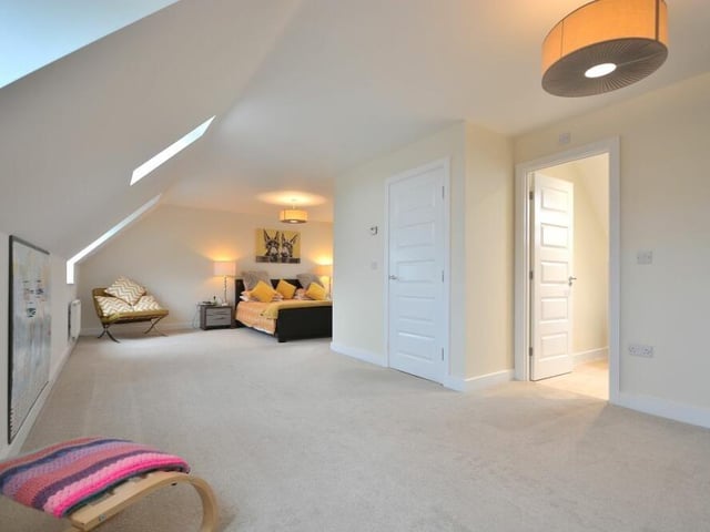 Up another floor now and time to inspect the magnificent master bedroom which, as you can see, is an exceptional size.