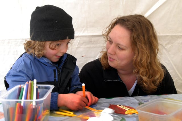 Four year old Ruairi Gent and his mother Heather enjoy the crafts at the May Day event held at Kingsway Park, Kirkby, 2009.