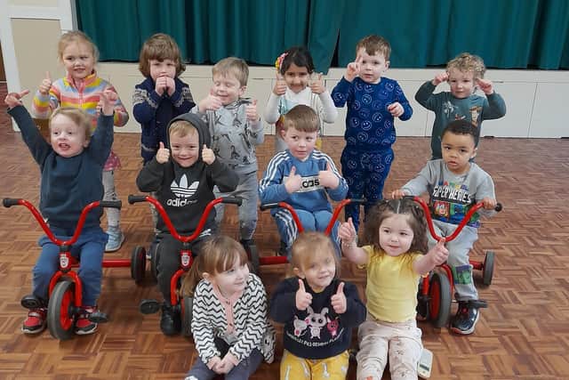 Children at Kimberley Pre-School Playgroup celebrate its ‘good’ Ofsted rating.
