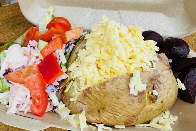 This week's topping was cheese, salad and slaw.