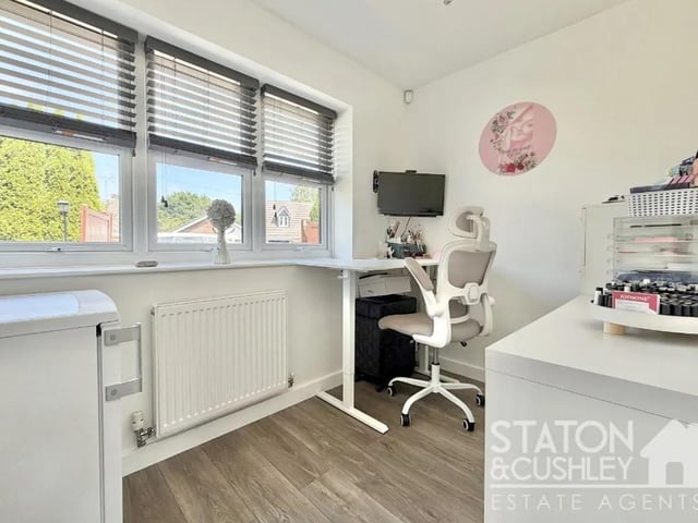 The spacious property boasts ample room for a home office