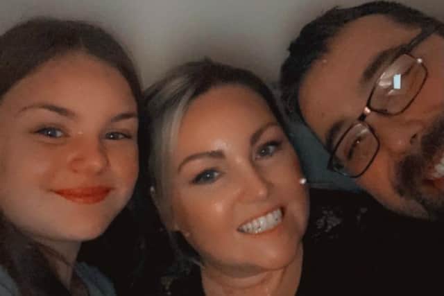 Kerri March is now recovering well but can still only walk a few steps, but is determined to attend her best friend's wedding later this year,
She is pictured here with partner Gary and daughter Ellie.
