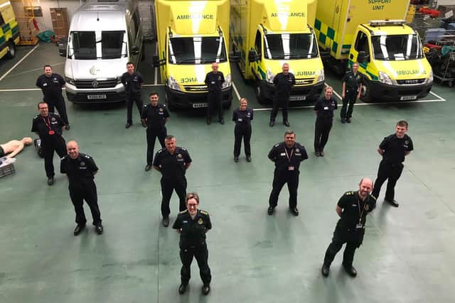 Firefighters preparing to volunteer to help EMAS paramedics