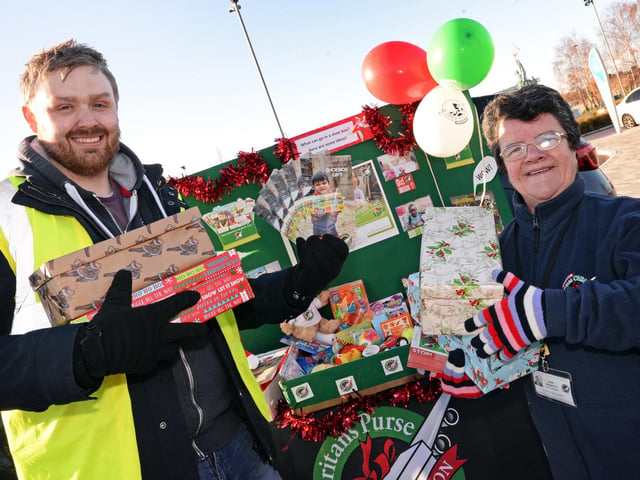 Adam Tankard, Operation Christmas child regional manager and Jean Gravette,  Doncaster, Goole & Retford Area Co-ordinator, pictured at Wheatley Shopping Centre in 2017