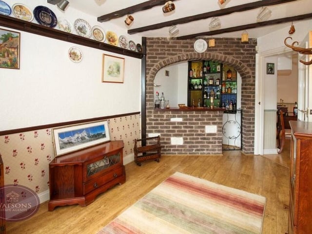 This is a terrific view of the fitted bar within the dining room. Purpose-built, it oozes character.