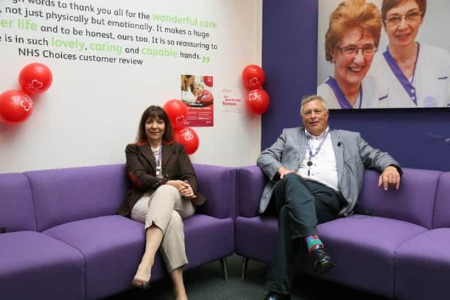 Karyn MacKenzie, group managing director, and Andy Hogarth, CEO, celebrating the year long partnership with the British Heart Foundation