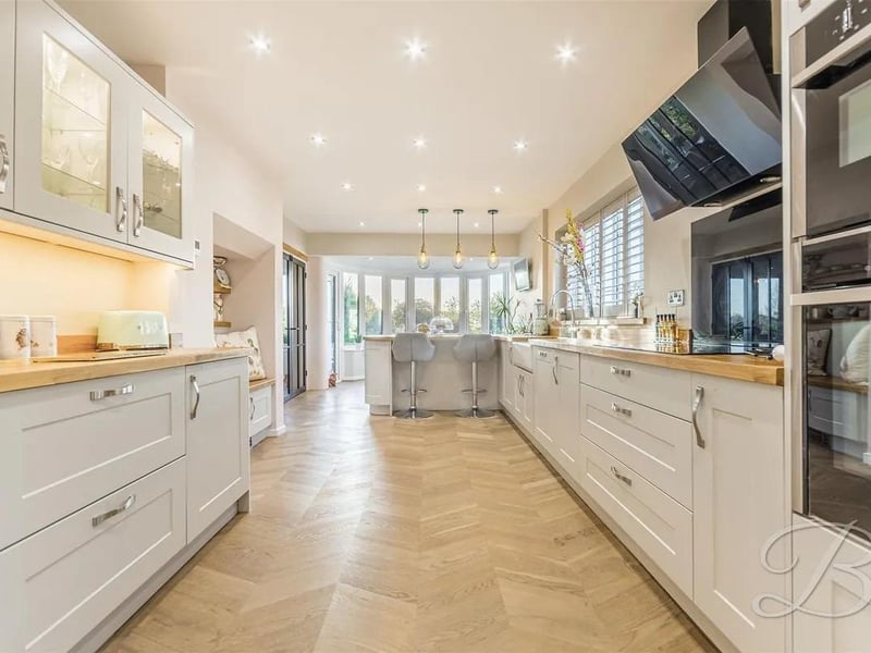 The house is complete with an open-plan, high-end shaker-style kitchen that features a large bay window to the rear, allowing for an abundance of natural light.