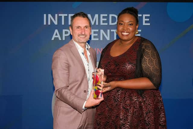 Naomi Kinlock of University Hospitals Derby and Burton NHS Foundation Trust recives the 2024 Intermediate Apprentice from National World group editor Phil Bramley