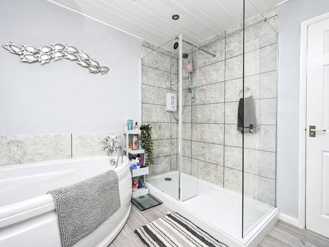 This second bathroom is sleek and stylish.