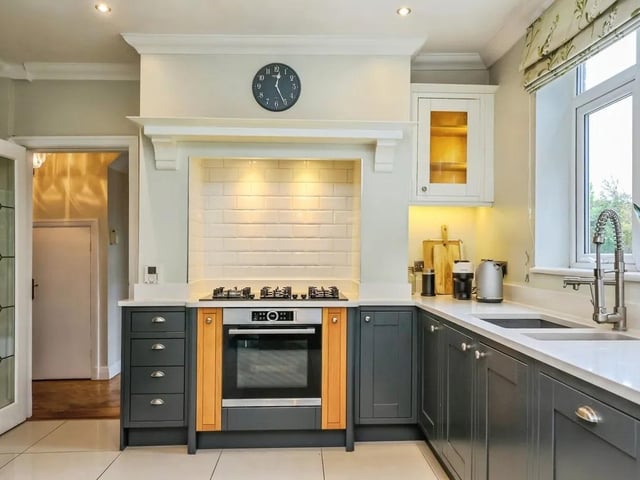 The modern kitchen is a real highlight - fitted with a range of units, integrated appliances