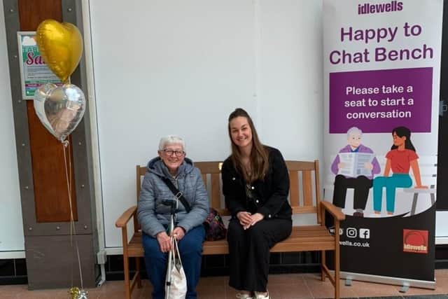 Shopper Lorna Harrison, left, tests out the new bench with Frances Smith, Idlewells marketing manager.