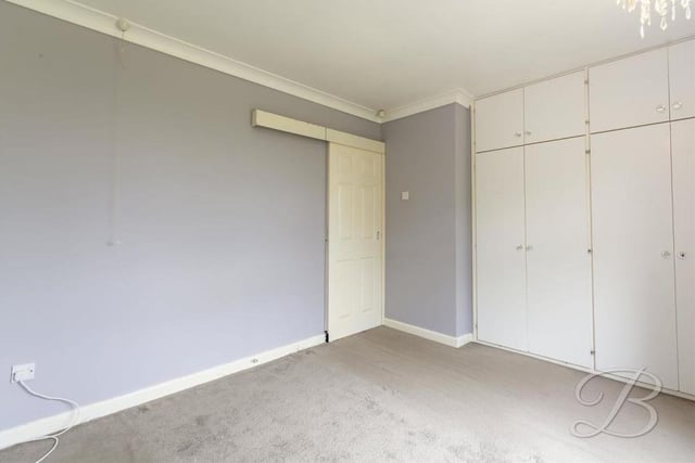 More large fitted wardrobes in this bedroom which, like the first, is well presented.