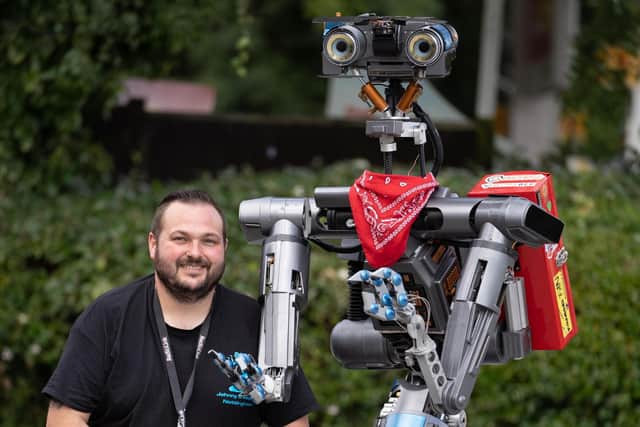 Ryan spent six years and £20,000 recreating the android from the cult 1986 film in his garage at his home. Photo: Tom Maddick/SWNS