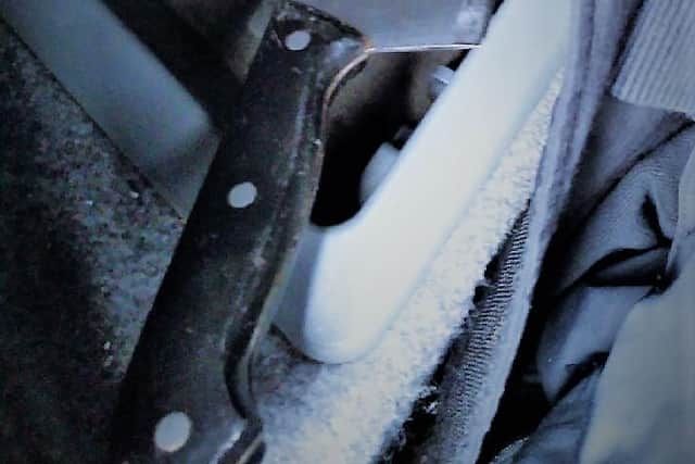 A meat cleaver was found in the vehicle.