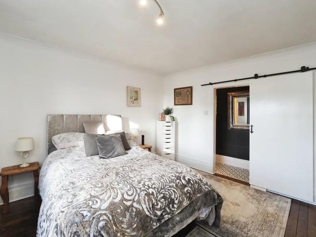 One of four tastefully decorated bedrooms in the property
