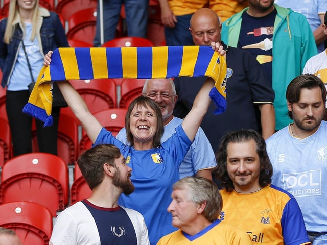 Mansfield Town fans enjoy the 3-1 win at Doncaster Rovers.