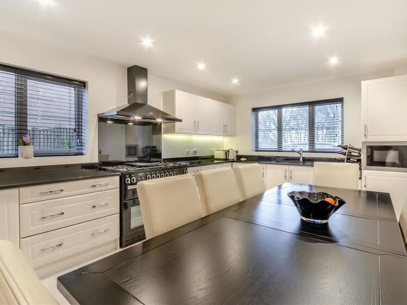 So spacious is the kitchen that there is ample room for a breakfast or dining table. There is also an integrated fridge, dishwasher and microwave, plus an inset stainless steel sink.