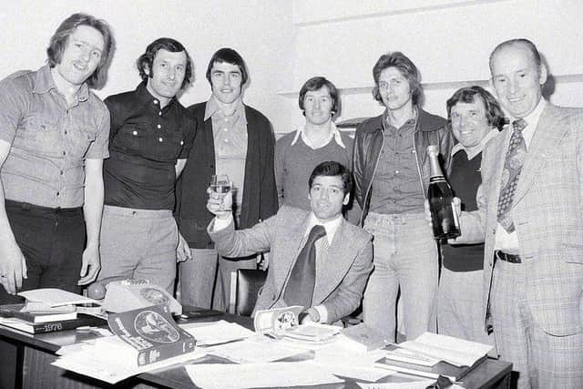 Stags celebrate promotion. Pictured from the left: Kevin Bird, Kevin Randall, Ernie Moss, Ian McDonald, Ian McKenzie, Jerry Clarke, coach, and club chairman Arthur Patrick. Seated is team manager Peter Morris.