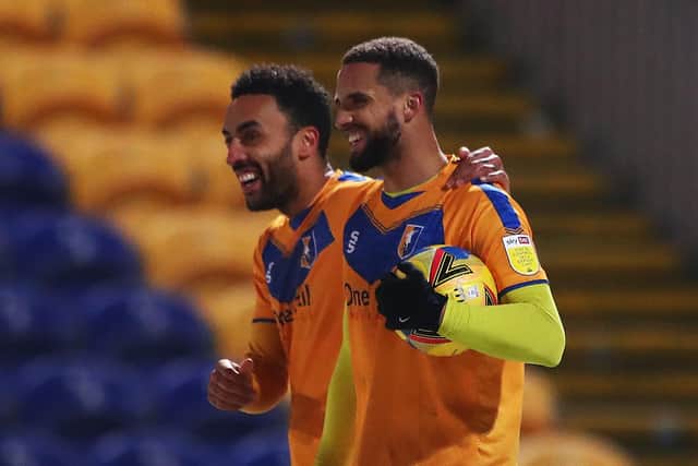 James Perch congratulates Jordan Bowery (right) on his hat trick. (Photo by Matthew Lewis/Getty Images)