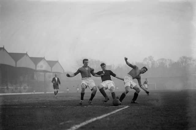 Arsenal centre forward J Brain breaks tries to get past the Mansfield defence at Highbury on 26th January 1929.  (Photo by Harold Clements/London Express/Getty Images)