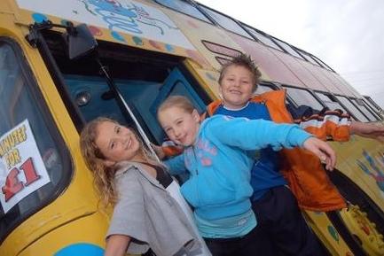 Youngsters made the best of a party play bus at the JTF Charity funday from left are Amelia Betts,Grace Myatt and Brad Baugh.