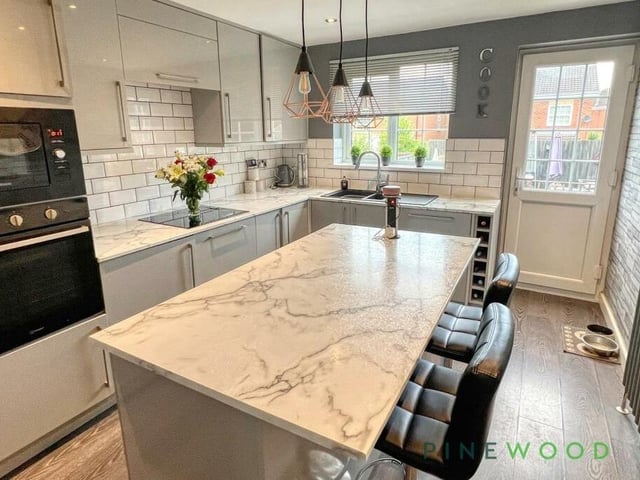 Estate agents Pinewood Properties say the heart of the home is this contemporary breakfast kitchen with an inviting island that has pan drawers and a pop-up power socket. Only six years old and with a 25-year guarantee, it includes an integrated induction hob, oven, microwave and fridge freezer, as well as space for a washing machine.