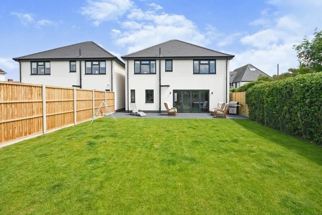 As you can see, the house is as attractive from the back as it is from the front. A large lawn is low maintenance and enclosed by secure fencing or a hedged boundary.