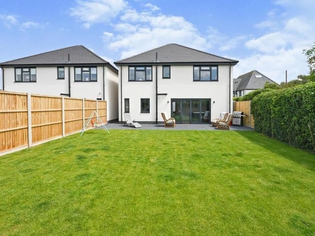 As you can see, the house is as attractive from the back as it is from the front. A large lawn is low maintenance and enclosed by secure fencing or a hedged boundary.