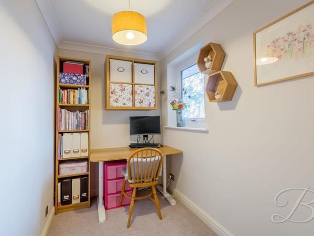 The final bedroom at the £525,000 house is the smallest of the four and can easily be converted into a compact office. The floor is carpeted and there is a cupboard for storage.