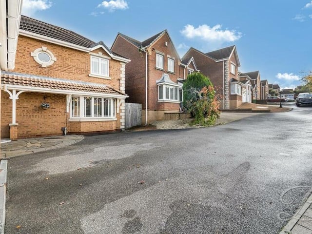 The front of the £360,000-plus property also boasts a large driveway, allowing off-street parking space for multiple cars.