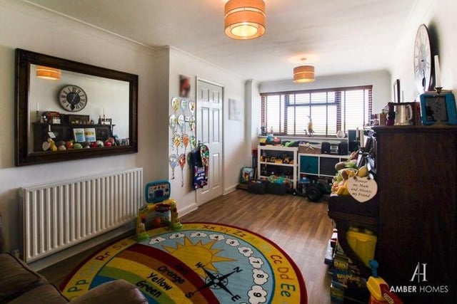 A second reception room on the ground floor is this dining room, which is currently being used a a playroom for the kids. Versatile, it occupies the left-hand portion of the house.