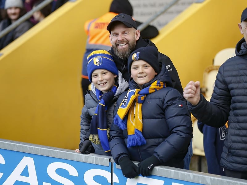 Mansfield Town fans ahead of kick-off against Rochdale on 10 April 2023.