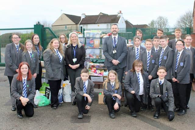 Headteacher, Deputy Headteacher and students from Selston High School with food bank supplies