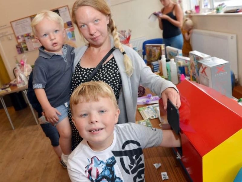 Enjoying a family fun day at Ironville Church Hall are Marie, David and Lewis Homar.