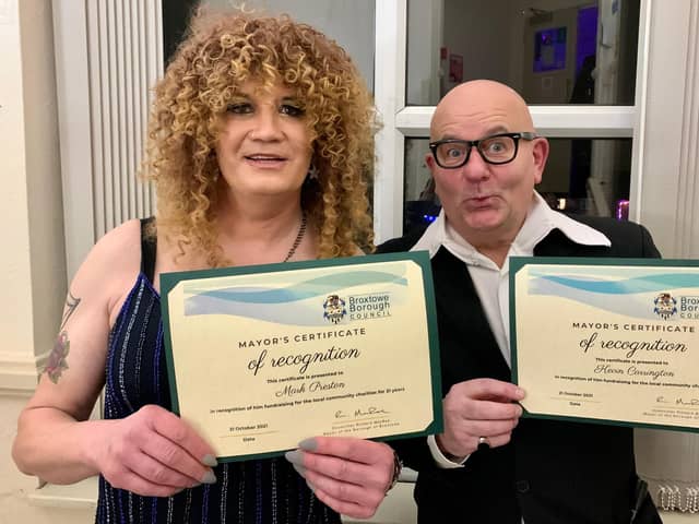 Show organisers Mark Preston (aka Miss Zandra) and Kevin Carrington (as Harry Hill) with their certificates of recognition.
