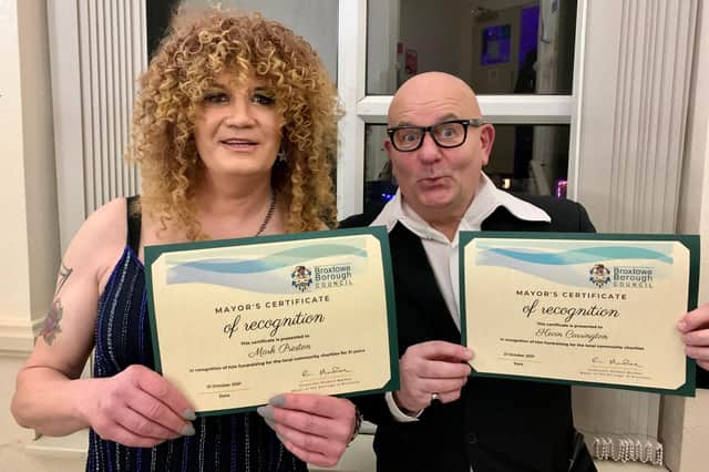 Show organisers Mark Preston (aka Miss Zandra) and Kevin Carrington (as Harry Hill) with their certificates of recognition.