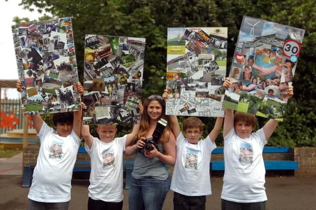 Photographer Holly Eve Watson with pupils l-r Keiran Randhawa, James Whittaker, Ben Watson and Owen Dorwood are pictured with boards of the area around the school as part of a history and heritage presentation in 2010.
