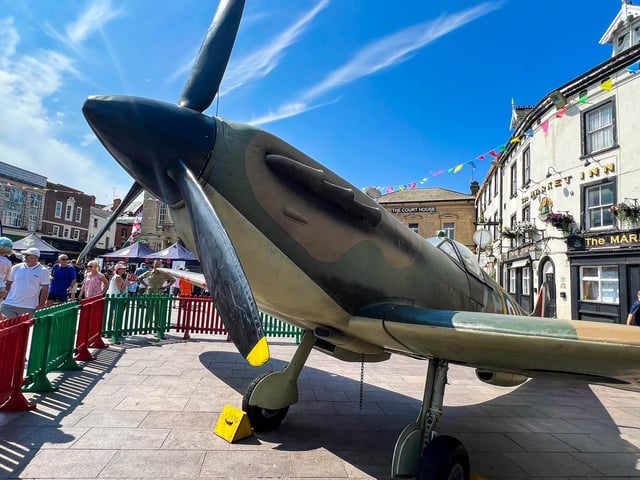 A full-size Spitfire plane was featured in the market place.