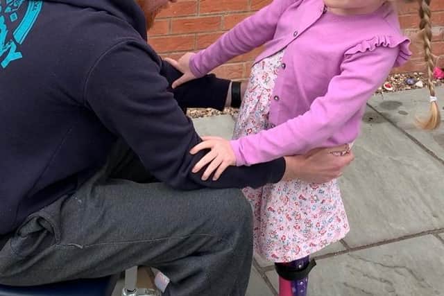 Elsie Novell took 26 steps to raise money for a charity that helped with her neurological condition.