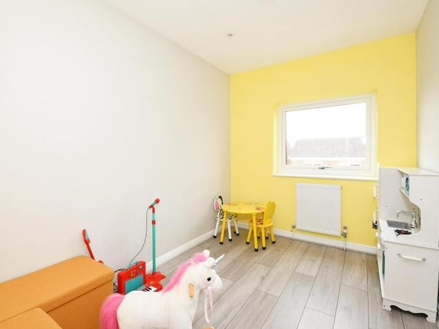 This fourth bedroom could be put to multiple uses.