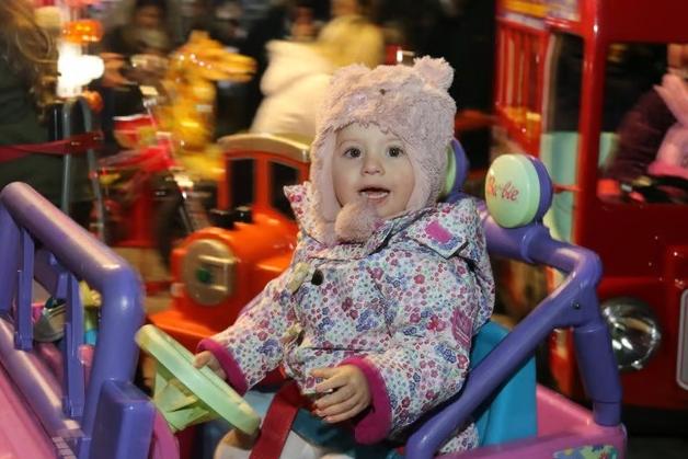 Amelie Musson pictured enjoying a turn on the roundabout ride back in 2017