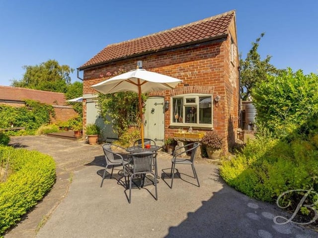 What a gorgeous place to sit in the sunshine at the back of the property.