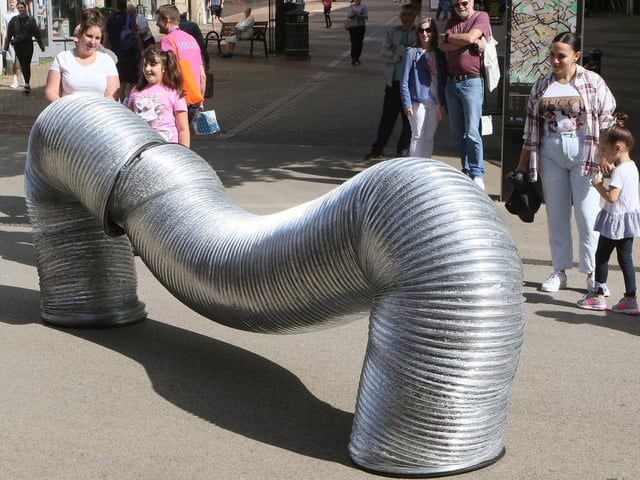 Big Mob's giant slinkies stop the shoppers in West Gate in 2023