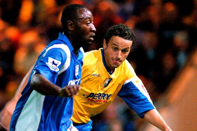 Gareth Jelleyman competes against Portsmouth's Tresor Lomana Lua Lua. Picture by Dan Westwell.