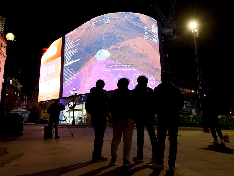 A general view of the live-stream landing of NASA's Perseverance on Mars at Piccadilly Circus.. The rover has been traveling through space since launching from Cape Canaveral at the end of July 2020.
