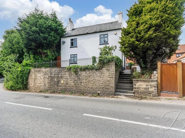 This wonderfully characterful four-bedroom farmhouse exudes charm and timeless elegance